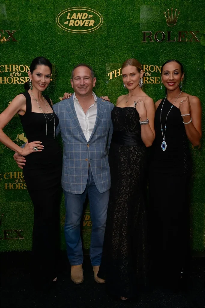 Moti Ferder poses with models and Lugano diamonds at the Central Park Horse Show nearly a dozen years ago. Now accused of fraud and theft, Ferder is back home in his native Israel.EUGENE GOLOGURSKY/GETTY IMAGES